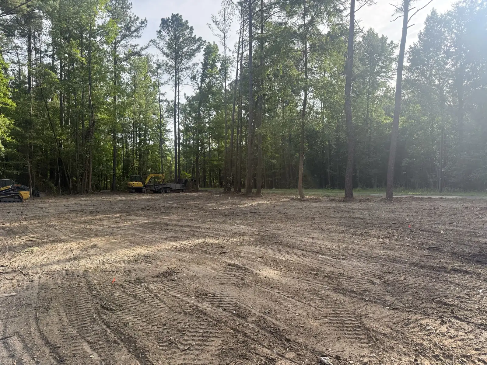 Lot cleared and graded by Hunter Houses among pines in Florence County, SC